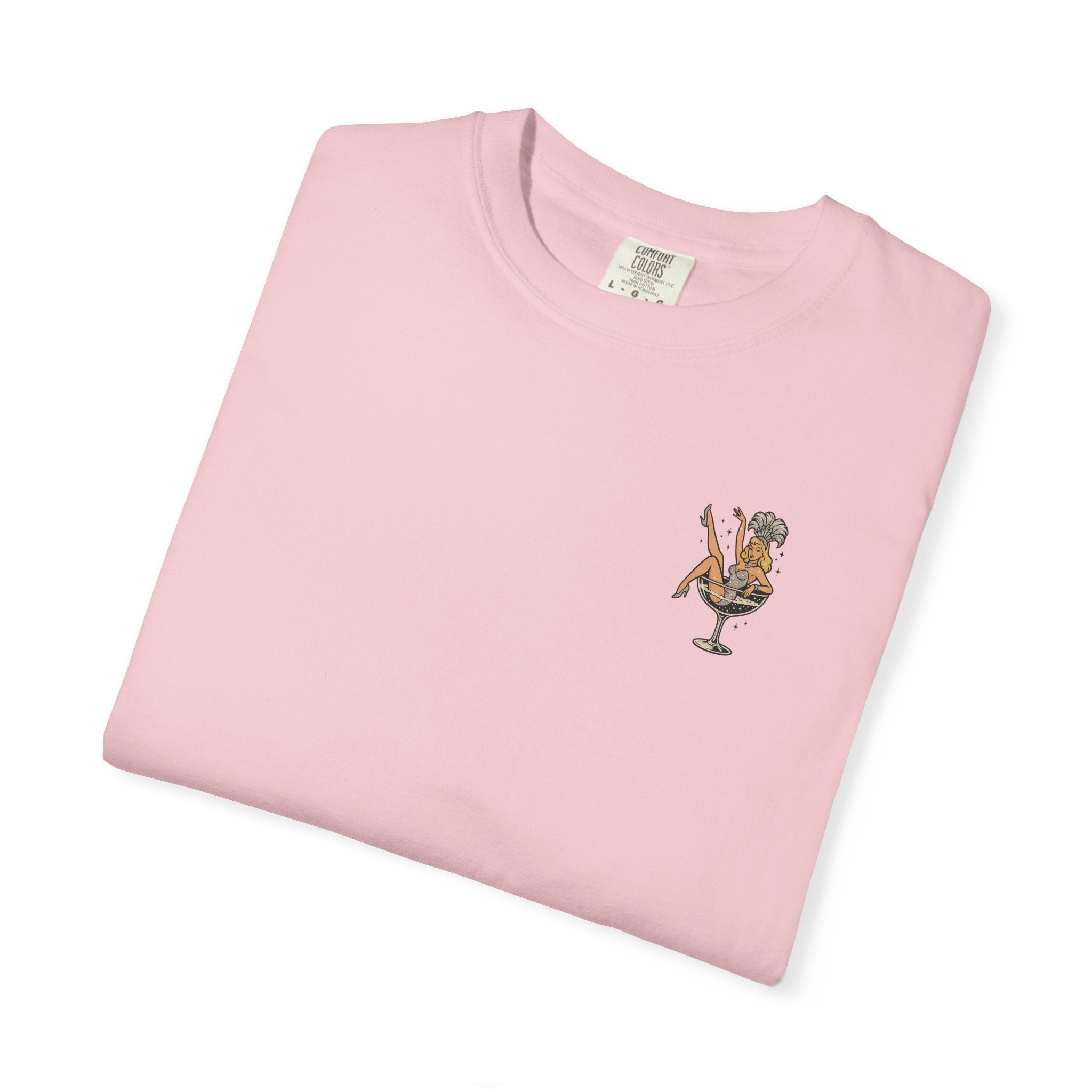 Folded pink t-shirt with a graphic design on a white background