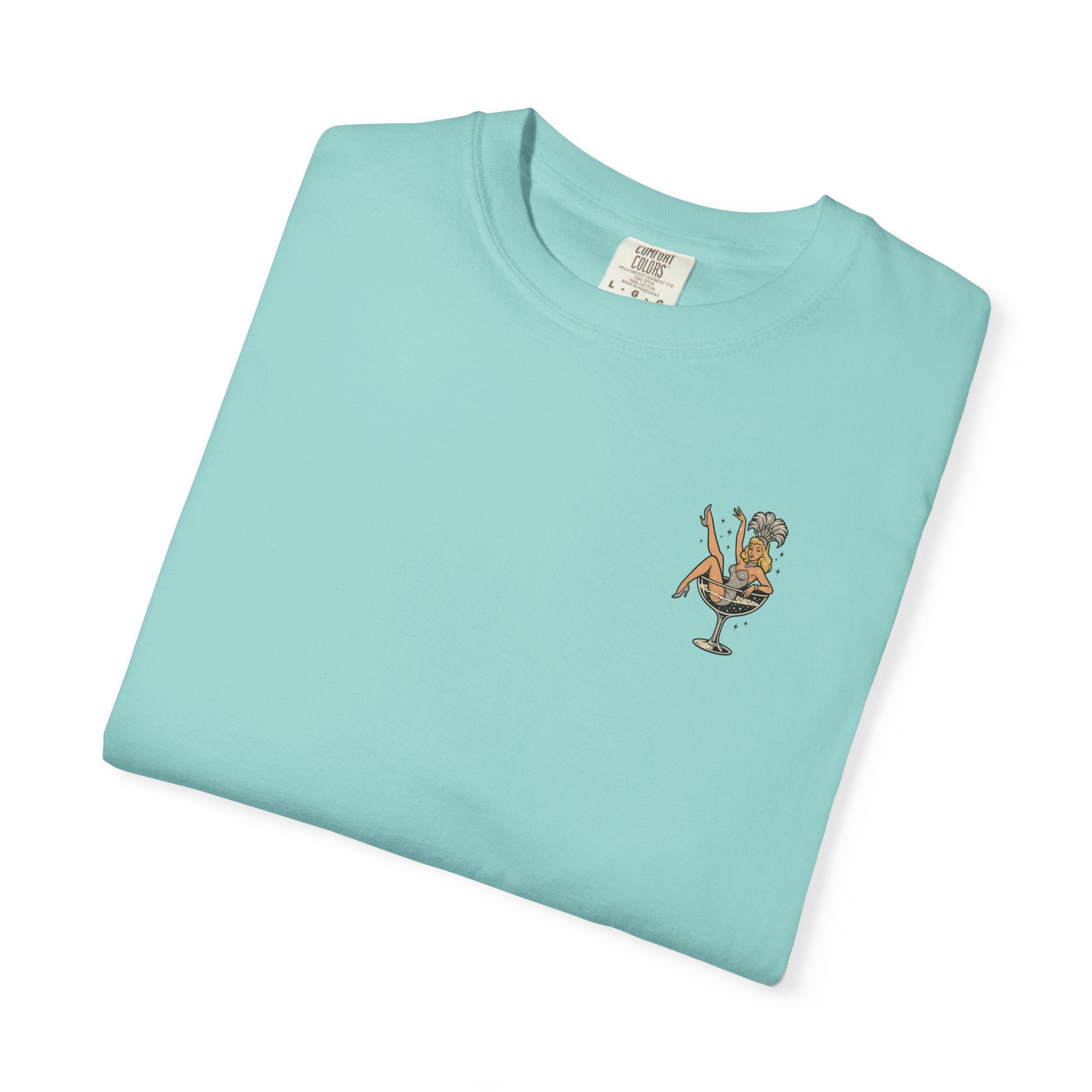 Folded chalky mint coloured t-shirt with a graphic design on a white background