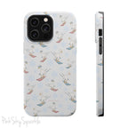 Silly Goose Magnetic iPhone Case. A whimsical iPhone case with a white background featuring illustrated geese skiing