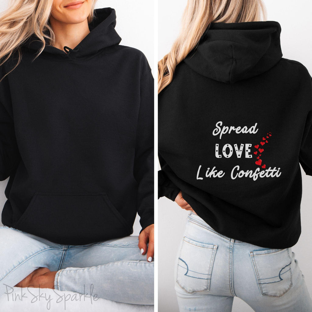 Cozy sweatshirt with the uplifting message “Spread Love Like Confetti” in bold, stylish font.