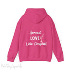 Cozy sweatshirt with the uplifting message “Spread Love Like Confetti” in bold, stylish font.