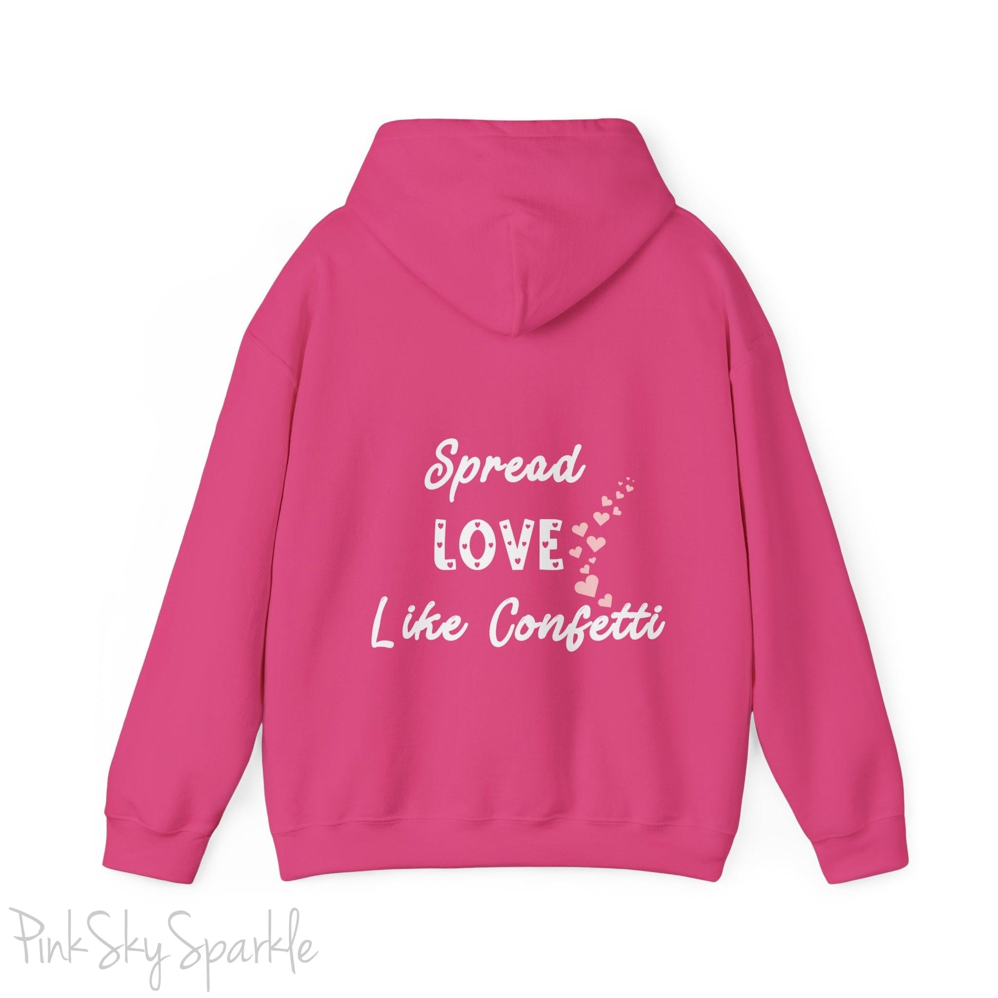 Cozy sweatshirt with the uplifting message “Spread Love Like Confetti” in bold, stylish font.