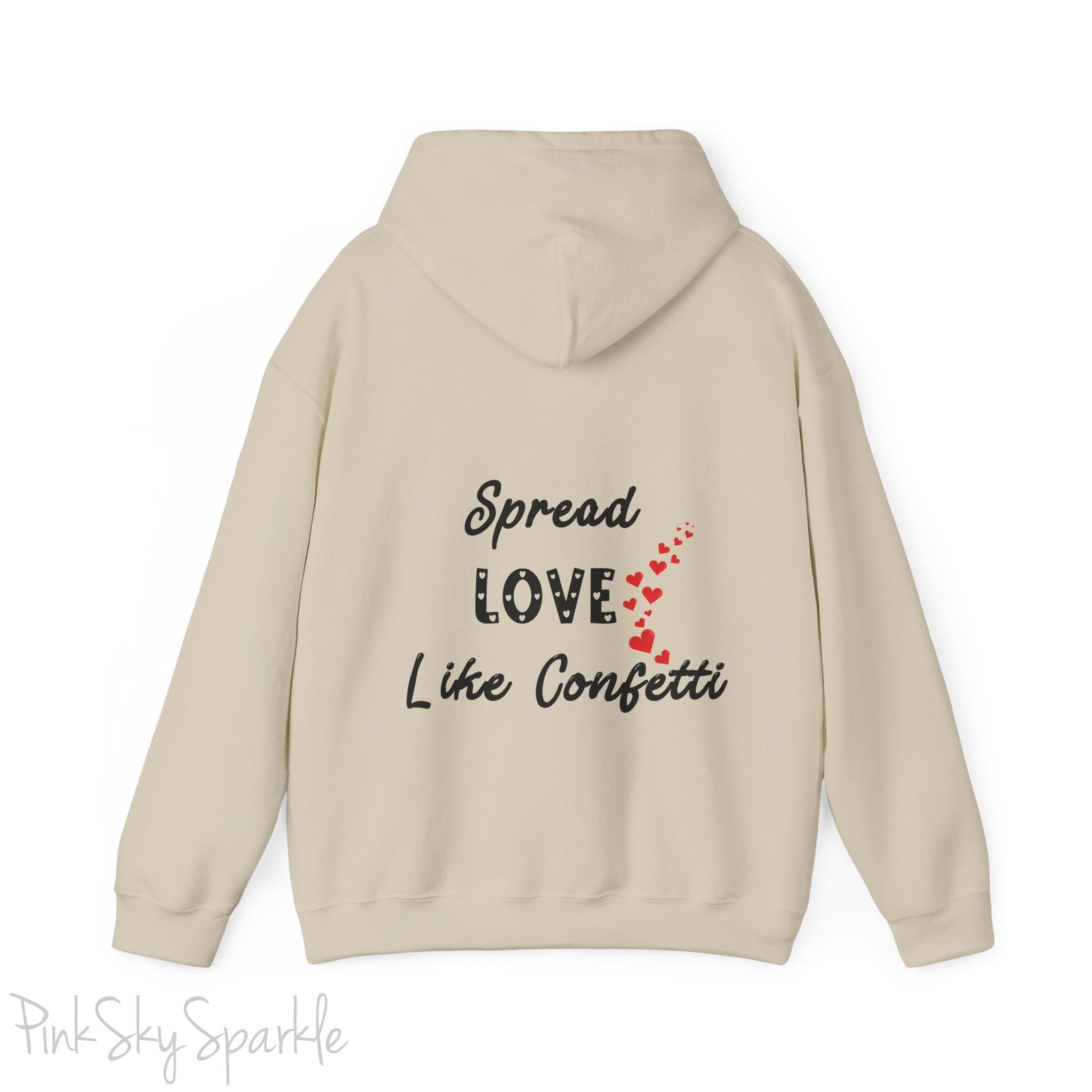 Cozy sweatshirt with the uplifting message “Spread Love Like Confetti” in bold, stylish font.