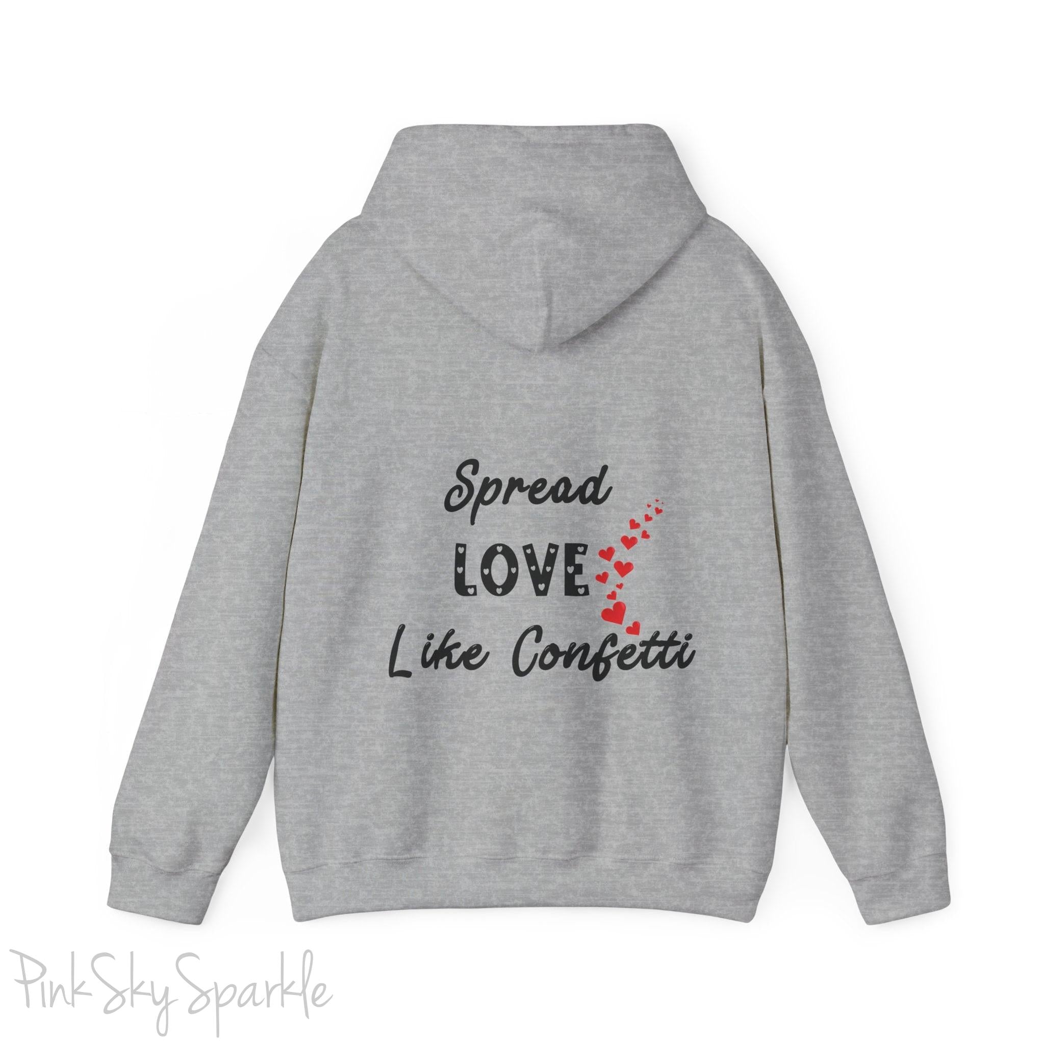 Cozy sweatshirt with the uplifting message “Spread Love Like Confetti” in bold, stylish font.
