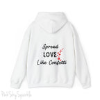 Cozy sweatshirt with the uplifting message “Spread Love Like Confetti” in bold, stylish font.