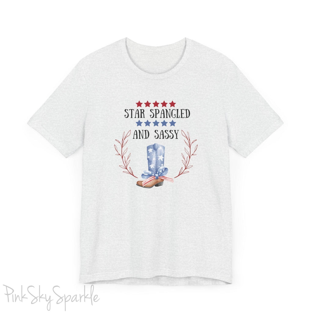 Celebrate the 4th of July in style with our "Star Spangled and Sassy" t-shirt! This festive tee features a bold and playful design that showcases the phrase "Star Spangled and Sassy" alongside a vibrant graphic of a red, white, and blue cowgirl boot. Perfect for Independence Day celebrations, backyard barbecues, or fireworks displays, this t-shirt is made from soft, high-quality fabric for ultimate comfort and durability.