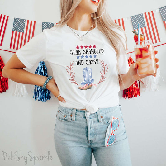Celebrate the 4th of July in style with our "Star Spangled and Sassy" t-shirt! This festive tee features a bold and playful design that showcases the phrase "Star Spangled and Sassy" alongside a vibrant graphic of a red, white, and blue cowgirl boot. Perfect for Independence Day celebrations, backyard barbecues, or fireworks displays, this t-shirt is made from soft, high-quality fabric for ultimate comfort and durability.