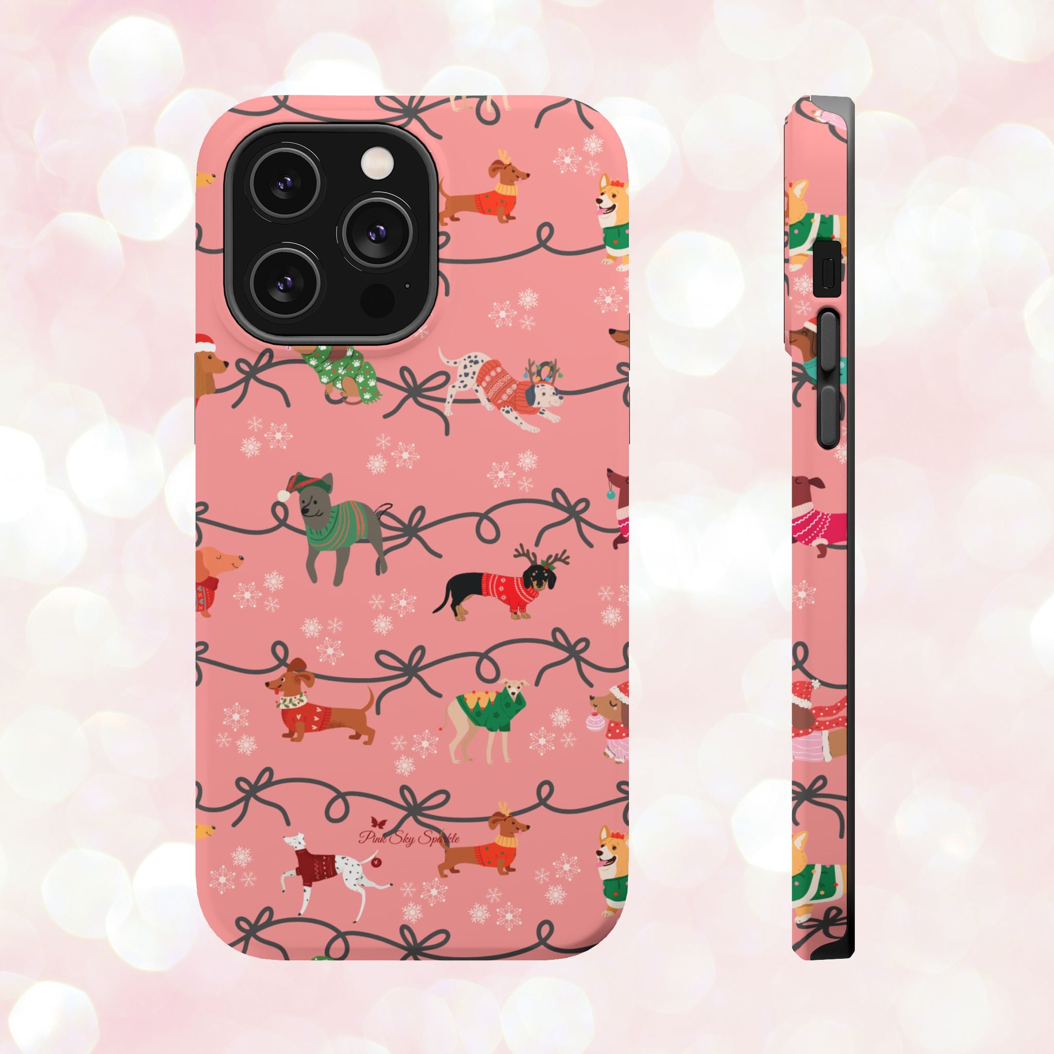 iPhone case with holiday dogs in sweaters on pink background.