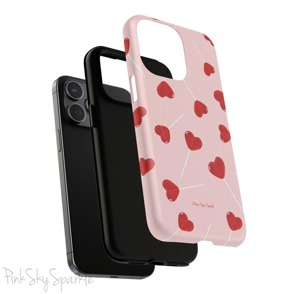 Pink phone case with red heart-shaped lollipop designs, perfect for Valentine’s Day or a playful aesthetic.