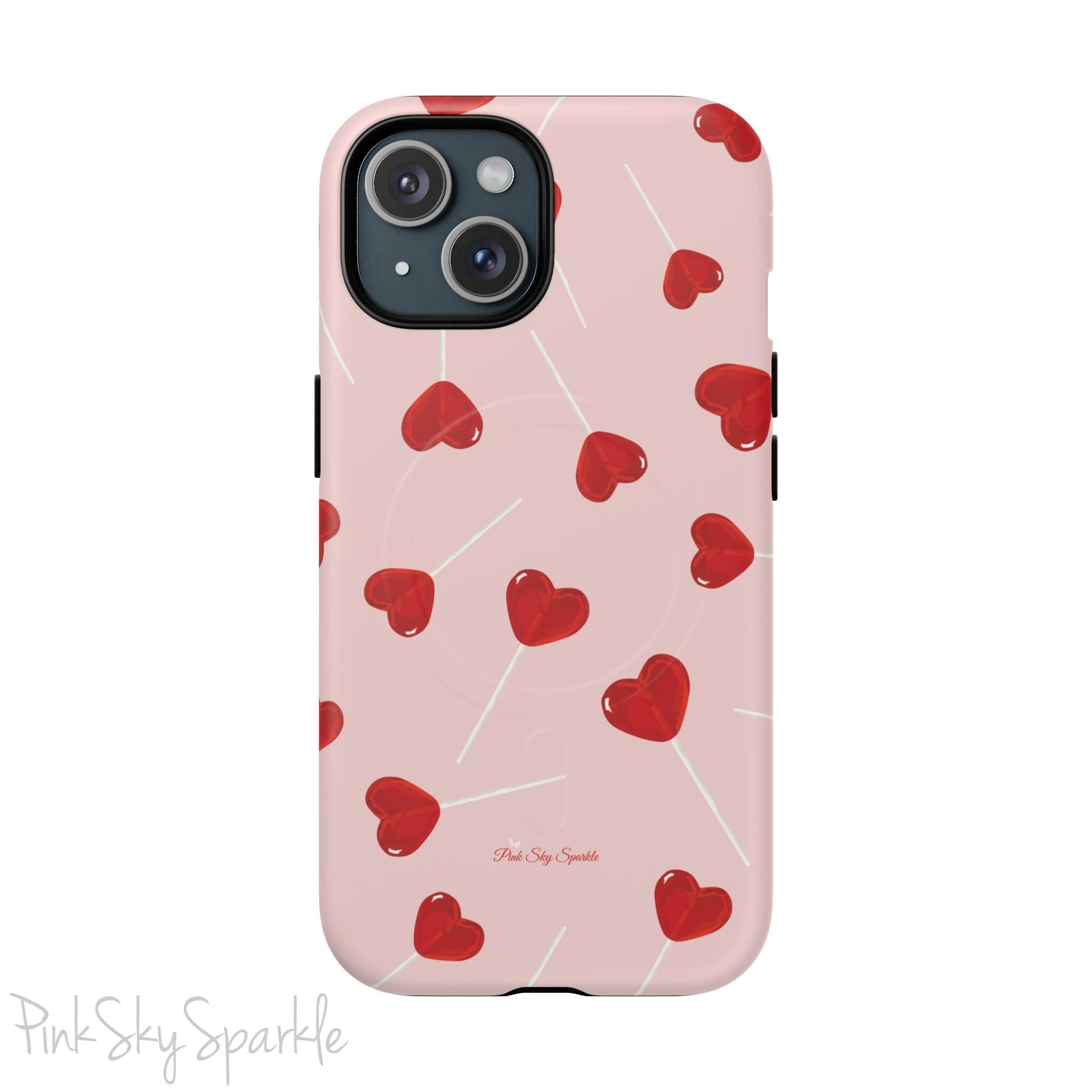 Pink phone case with red heart-shaped lollipop designs, perfect for Valentine’s Day or a playful aesthetic.