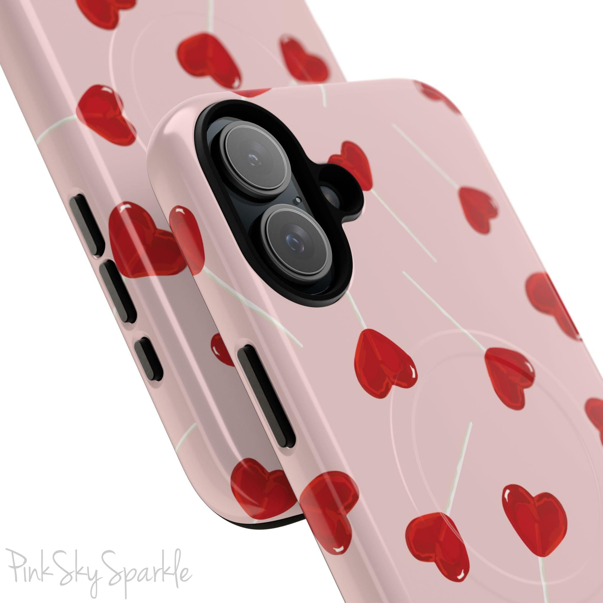 Pink phone case with red heart-shaped lollipop designs, perfect for Valentine’s Day or a playful aesthetic.