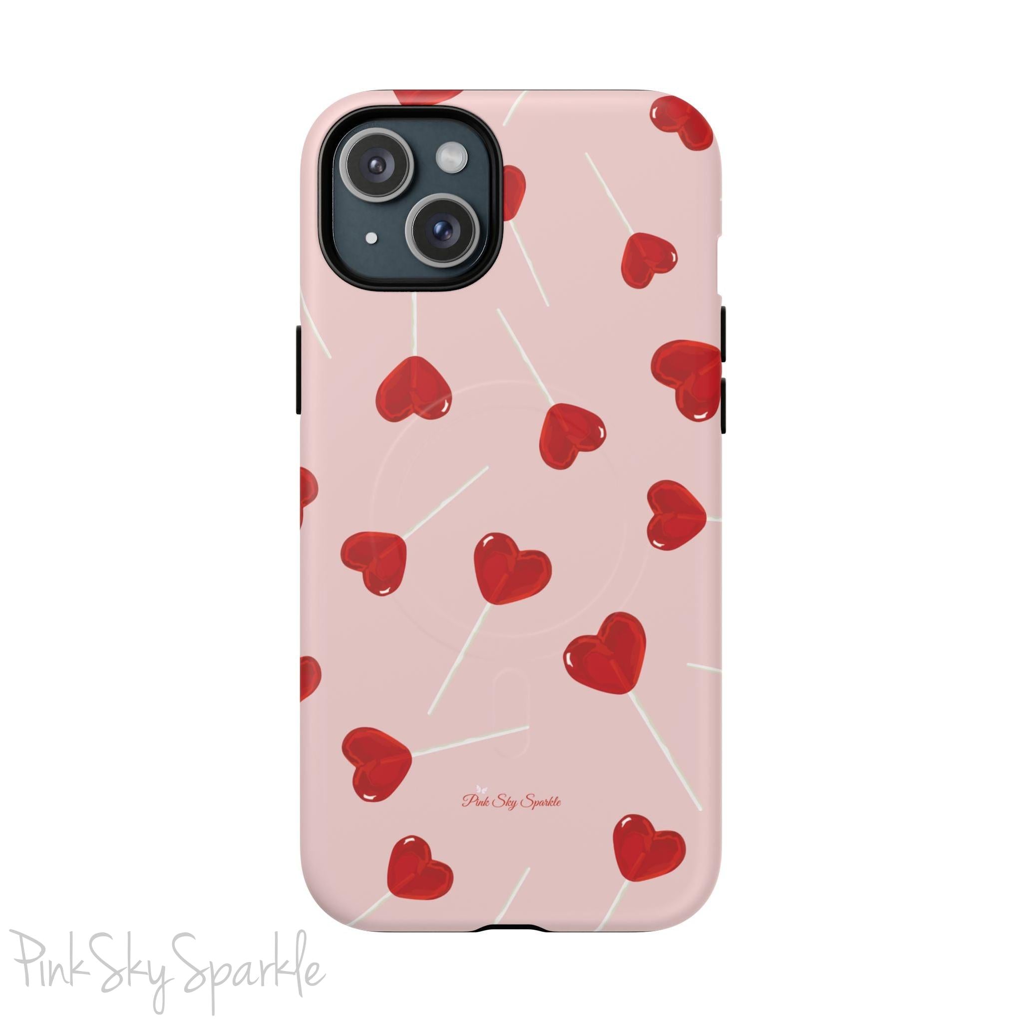 Pink phone case with red heart-shaped lollipop designs, perfect for Valentine’s Day or a playful aesthetic.
