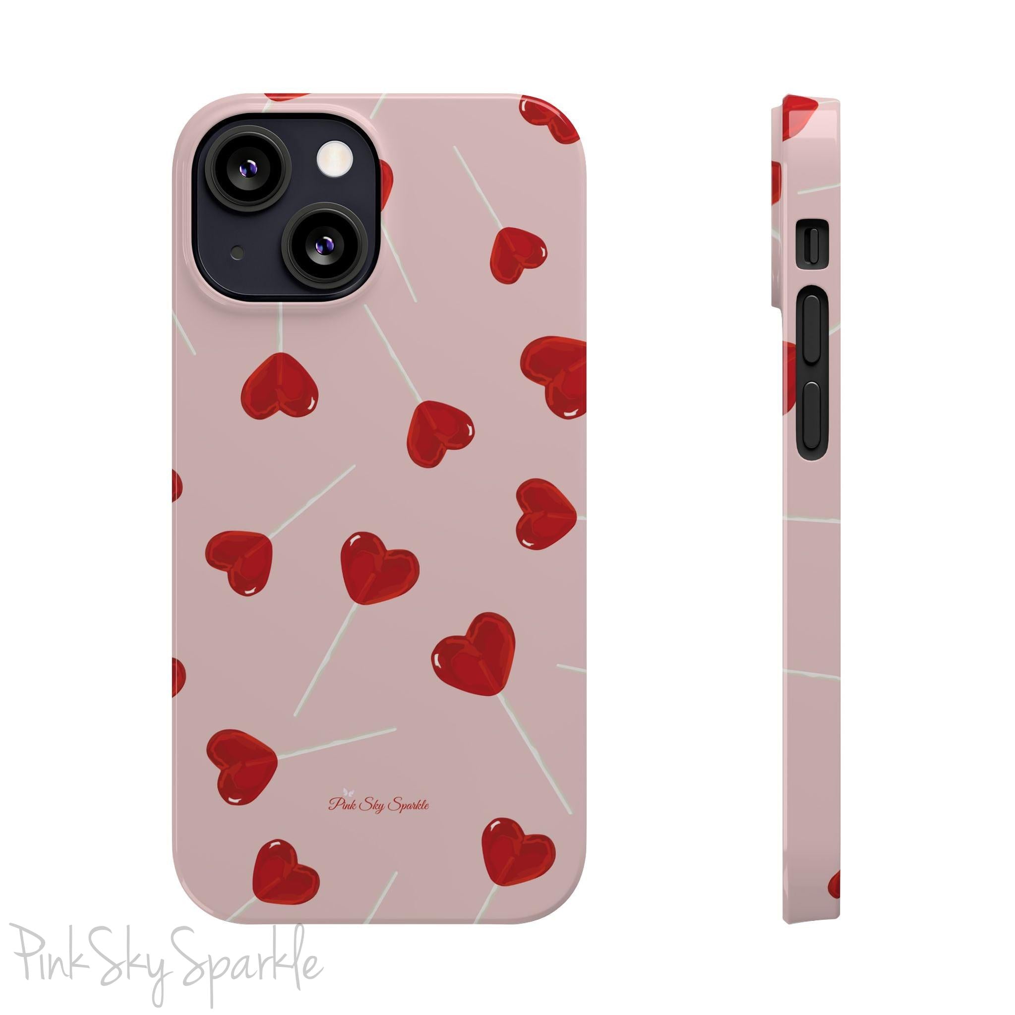 Pink phone case with red heart-shaped lollipop designs, perfect for Valentine’s Day or a playful aesthetic.