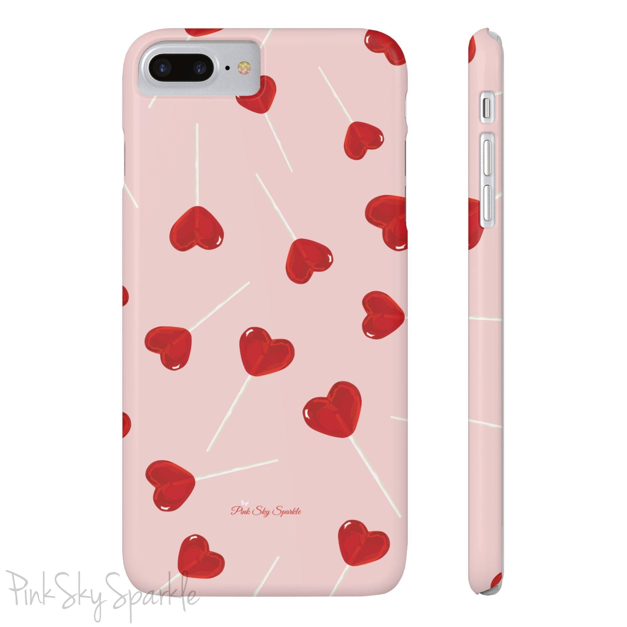 Pink phone case with red heart-shaped lollipop designs, perfect for Valentine’s Day or a playful aesthetic.