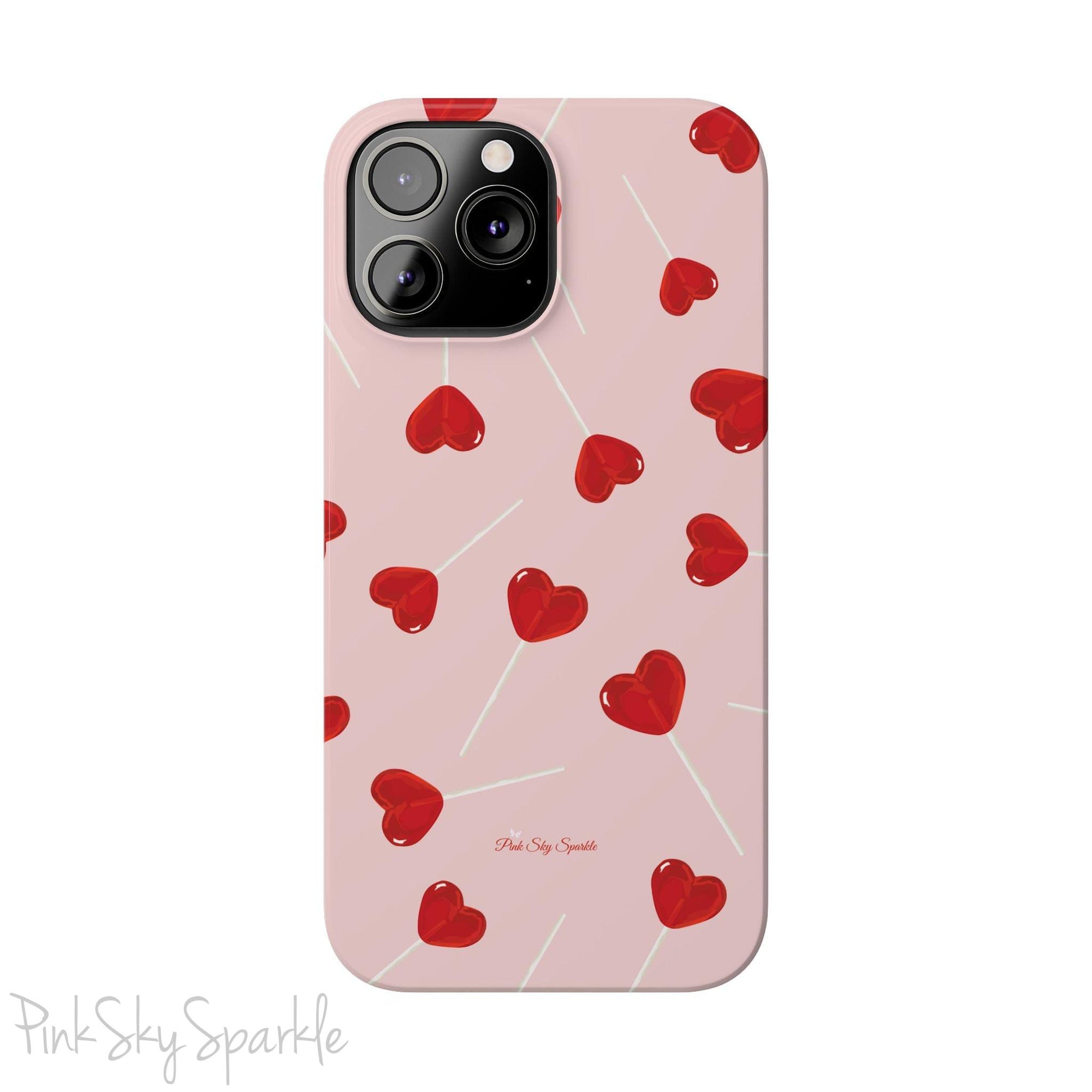 Pink phone case with red heart-shaped lollipop designs, perfect for Valentine’s Day or a playful aesthetic.