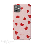 Pink phone case with red heart-shaped lollipop designs, perfect for Valentine’s Day or a playful aesthetic.