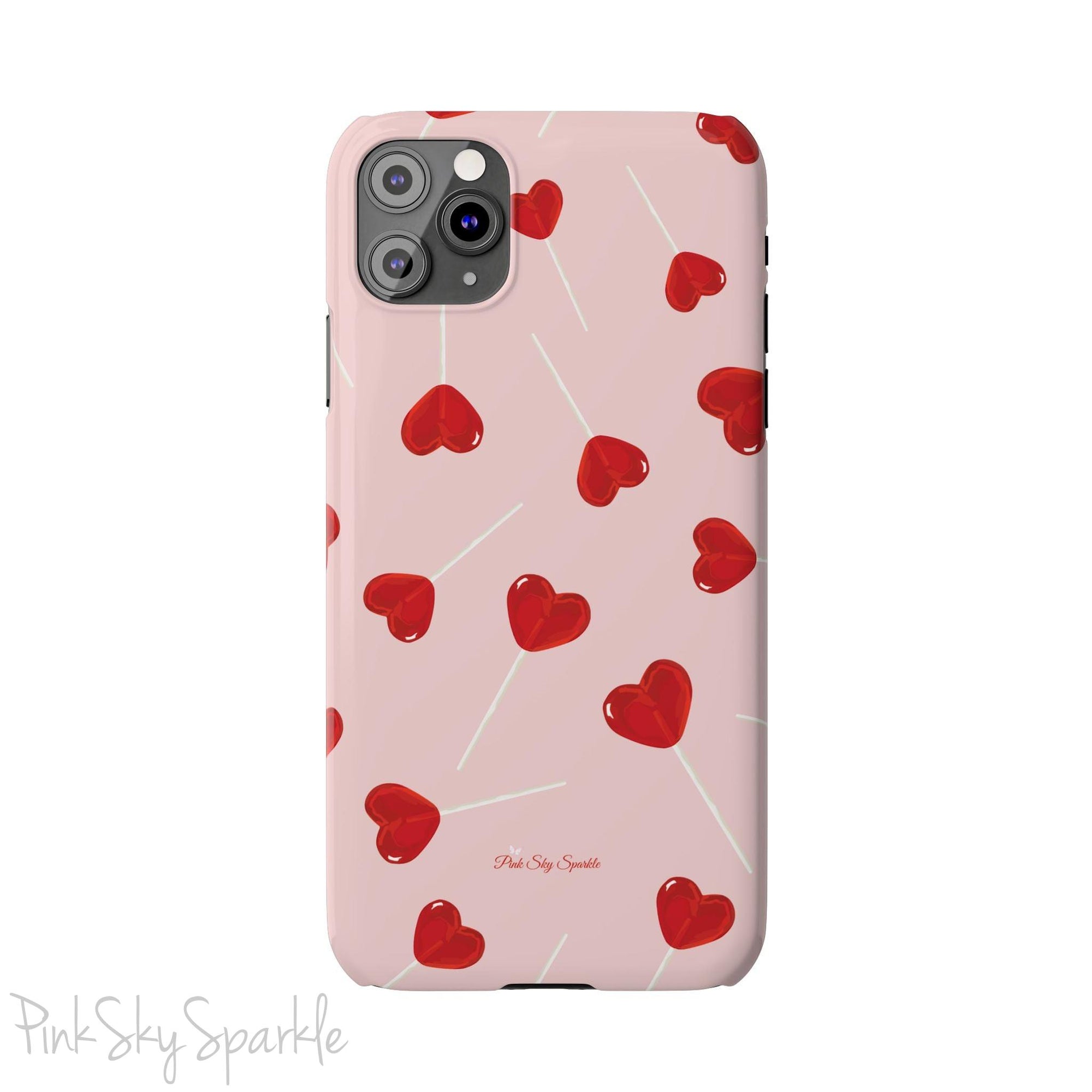 Pink phone case with red heart-shaped lollipop designs, perfect for Valentine’s Day or a playful aesthetic.