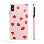 Pink phone case with red heart-shaped lollipop designs, perfect for Valentine’s Day or a playful aesthetic.