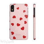 Pink phone case with red heart-shaped lollipop designs, perfect for Valentine’s Day or a playful aesthetic.