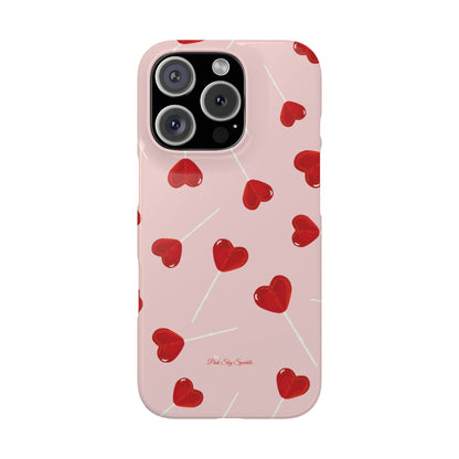 Pink phone case with red heart-shaped lollipop designs, perfect for Valentine’s Day or a playful aesthetic.