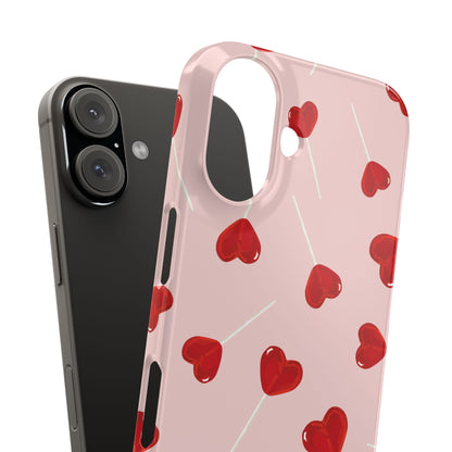 Pink phone case with red heart-shaped lollipop designs, perfect for Valentine’s Day or a playful aesthetic.