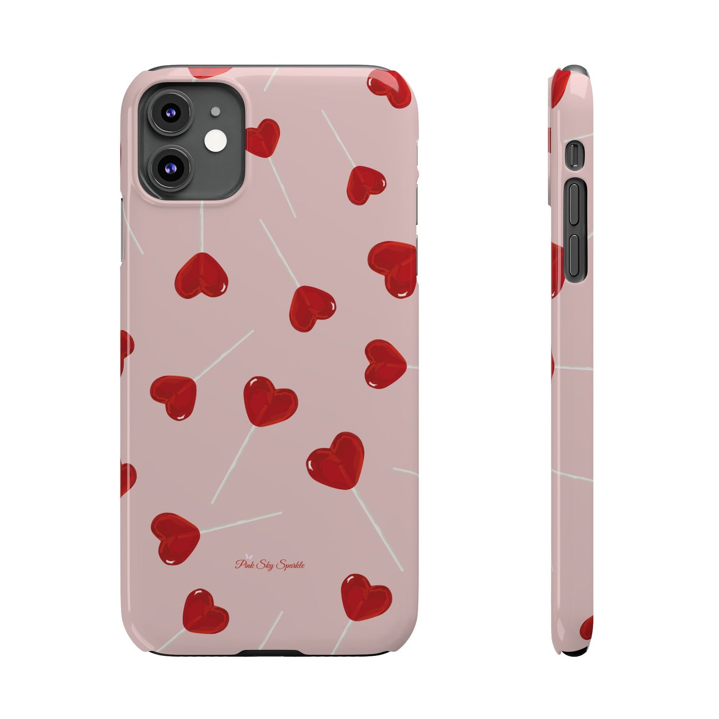 Pink phone case with red heart-shaped lollipop designs, perfect for Valentine’s Day or a playful aesthetic.