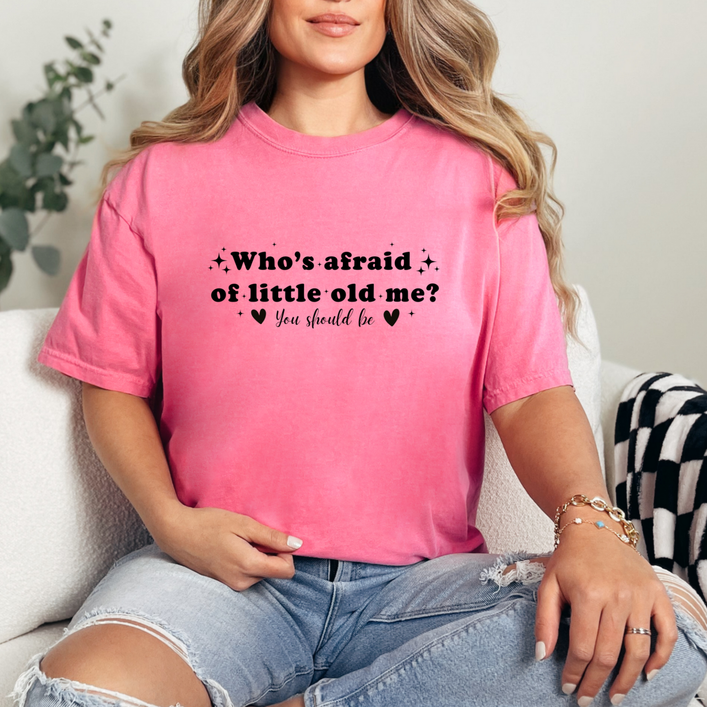 Crunchberry colour Comfort Colors Brand T-shirt with Taylor Swift inspired lyrics Who's afraid of little old me? You should be in black font.