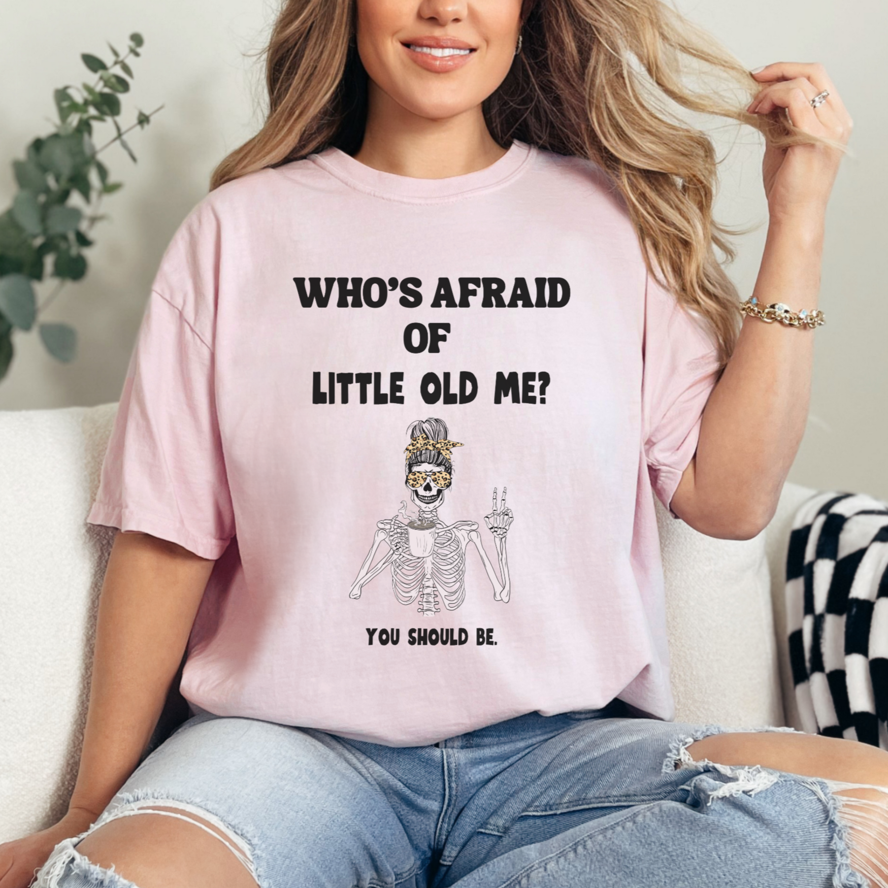 Blossom pink colored t-shirt - Who's Afraid of Little Old Me? You Should be. Skeleton drinking coffee and making peace sign design. 