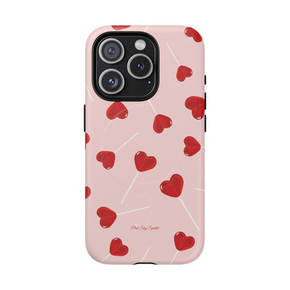 Pink phone case with red heart-shaped lollipop designs, perfect for Valentine’s Day or a playful aesthetic.