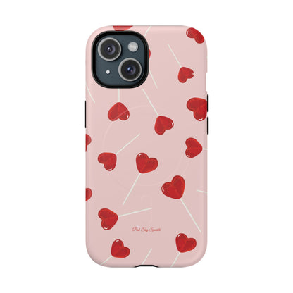 Pink phone case with red heart-shaped lollipop designs, perfect for Valentine’s Day or a playful aesthetic.