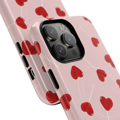 Pink phone case with red heart-shaped lollipop designs, perfect for Valentine’s Day or a playful aesthetic.