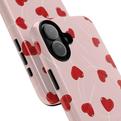 Pink phone case with red heart-shaped lollipop designs, perfect for Valentine’s Day or a playful aesthetic.