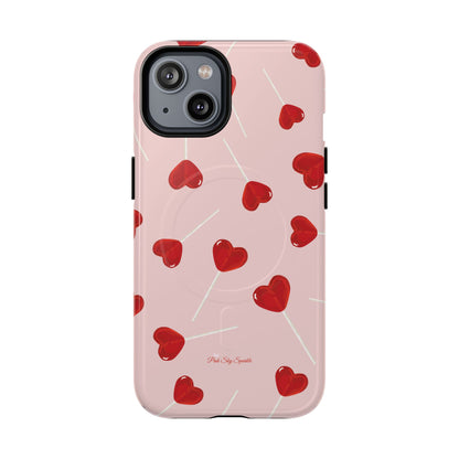 Pink phone case with red heart-shaped lollipop designs, perfect for Valentine’s Day or a playful aesthetic.